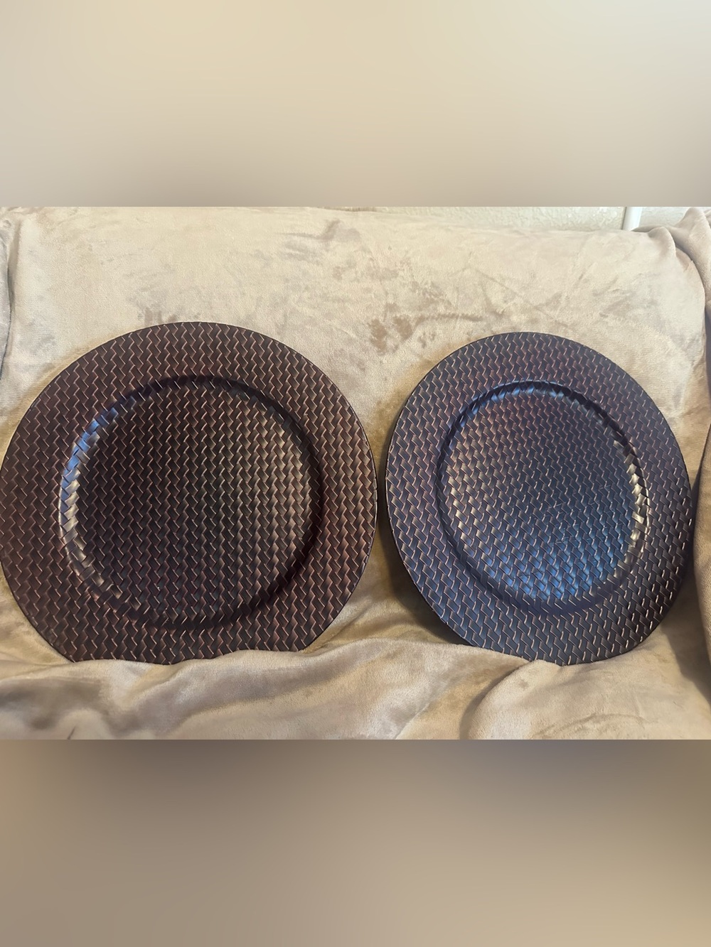 Set of 2 metallic brown plate chargers.